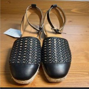 Black flat footed sandals